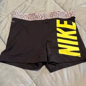 Nike Women's Black Shorts with Yellow Logo